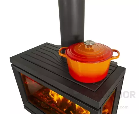 Superficie superior de la estufa Jøtul F 620 B apta para cocinar y mantener alimentos calientes.